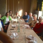 a group of former internees and family members at lunch