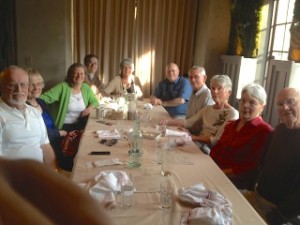 a group of former internees and family members at lunch
