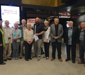 a group of attendees at documentary screening