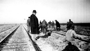 Internees work on railroad