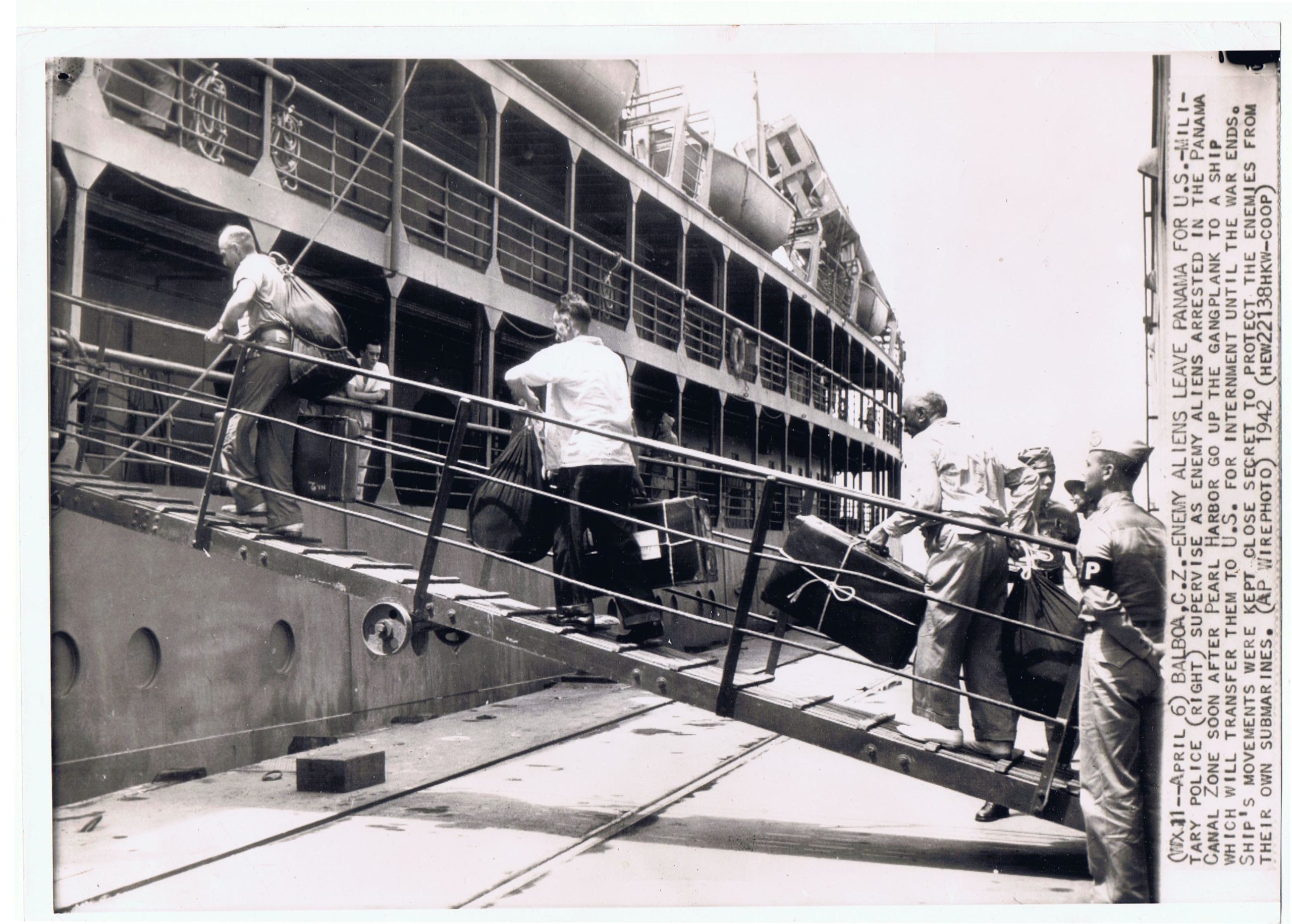 April 1942, Canal Zone-enemy aliens board ship for internment in  U.S.
