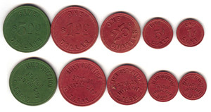 green and red coins used as currency in Crystal City Internment Camp