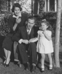 photo of father, mother, daughter