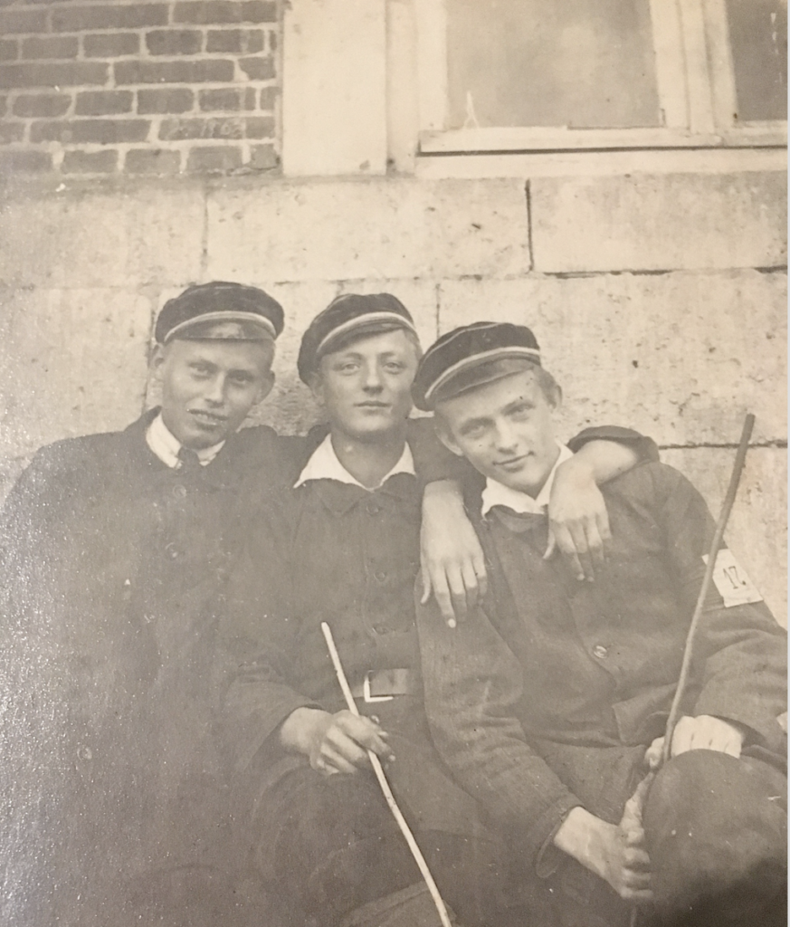 3 teen boys in school uniforms