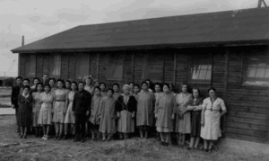 women outside building in Crystal City Camp